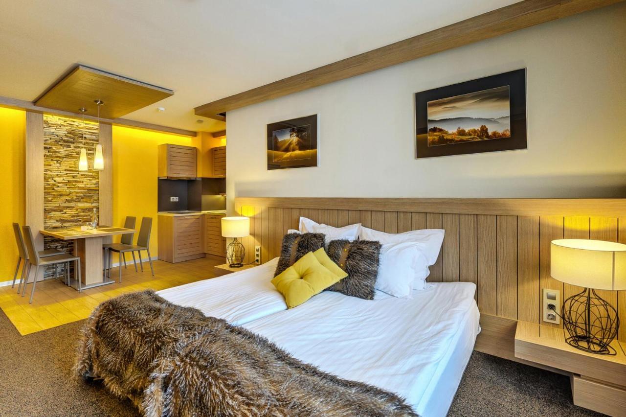 Amira Boutique Hotel Bansko Luaran gambar A bedroom in a hotel