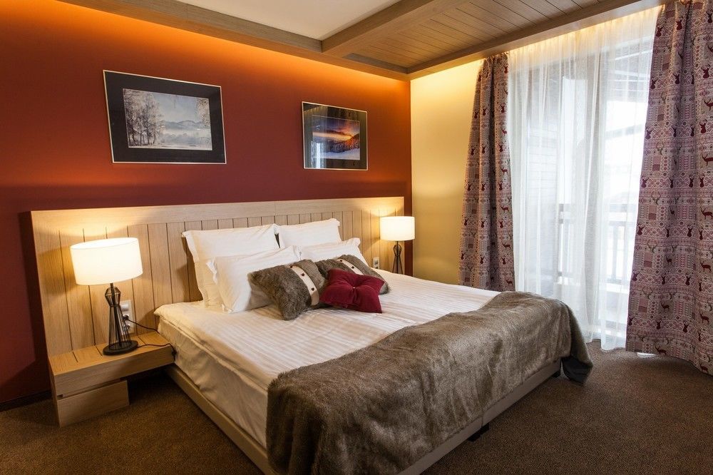Amira Boutique Hotel Bansko Luaran gambar A bedroom in a hotel