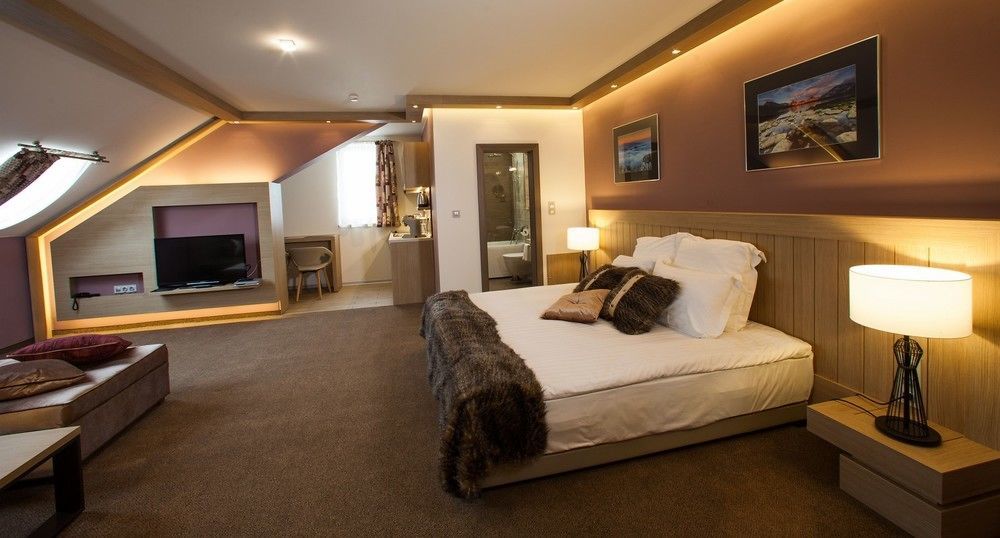 Amira Boutique Hotel Bansko Luaran gambar A bedroom at the Hotel de la Poste